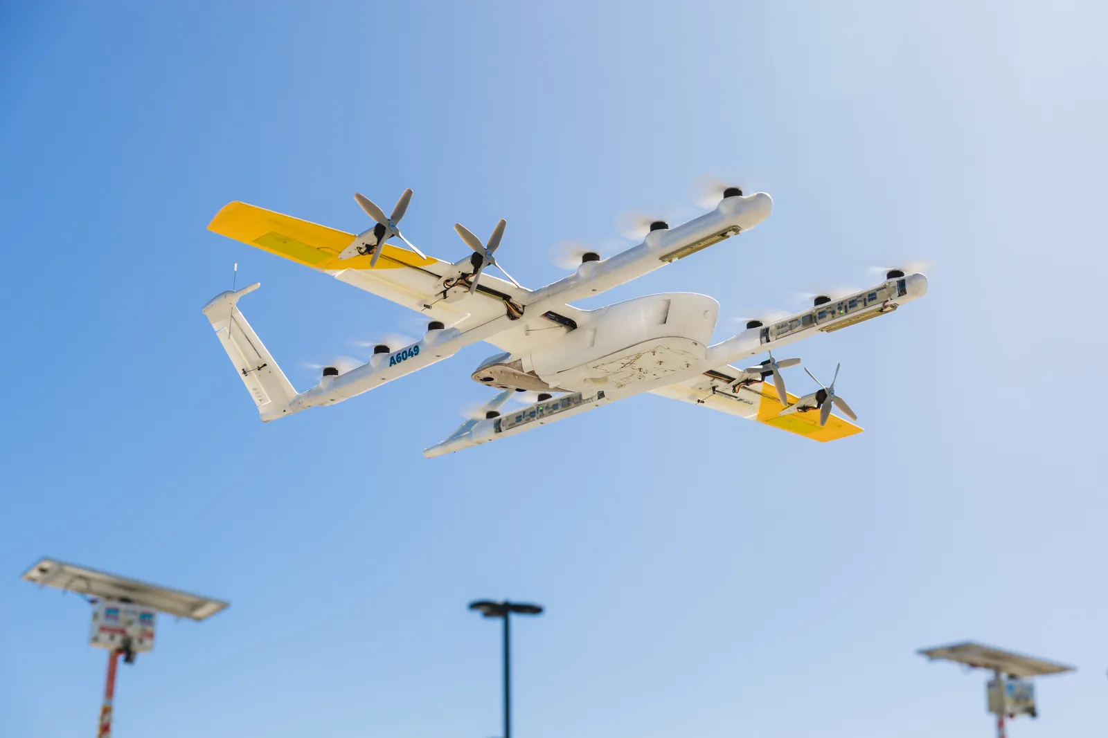 A Wing delivery drone in flight
